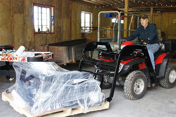 Hydraulic Powered Pallet Forks ATV Attachment In Action